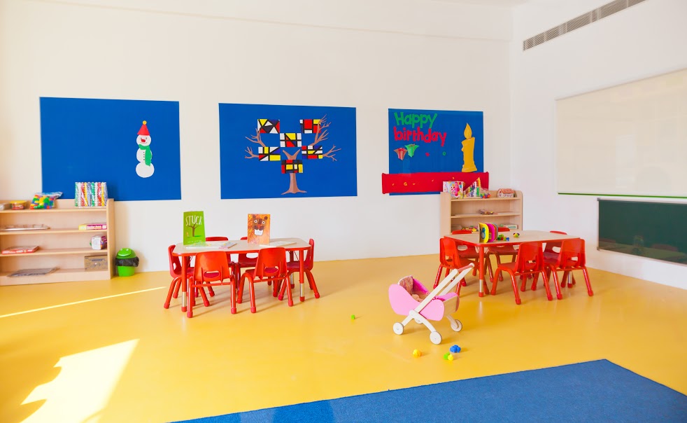Preschool classroom with display and storage wall