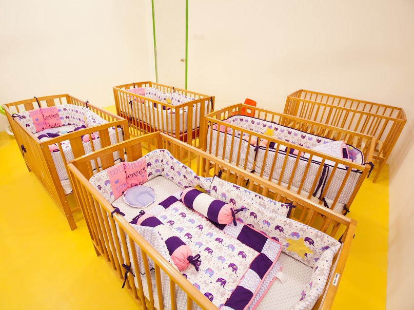 Infant nursery with cots and staff sightlines